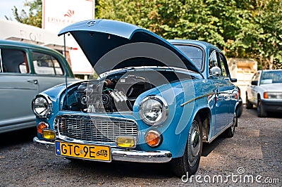 Classic old vintage veteran retro blue Polish car Syrena 104 with open engine compartment Editorial Stock Photo