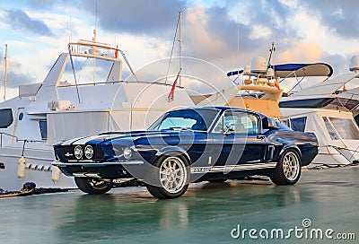 Classic rare American muscle car, vintage blue Ford Mustang Shelby Cobra GT-500 Fastback on a pier in Palma de Mallorca in Editorial Stock Photo