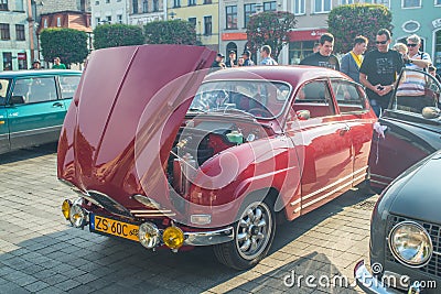 Classic vintage red Saab 96 two stroke motor parked Editorial Stock Photo