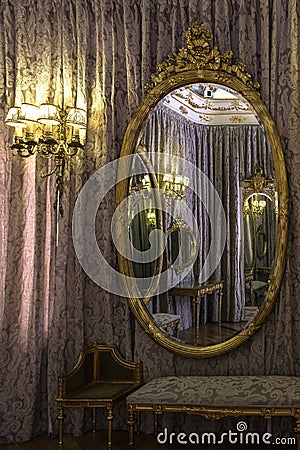 Classic room reflected in a mirror Stock Photo