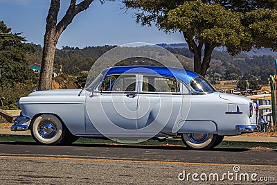 Classic 1950s Chevrolet Fleetline car in two-tone gray and blue outdoors in California Editorial Stock Photo