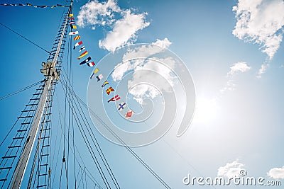 A classic sailboat moored to port Stock Photo