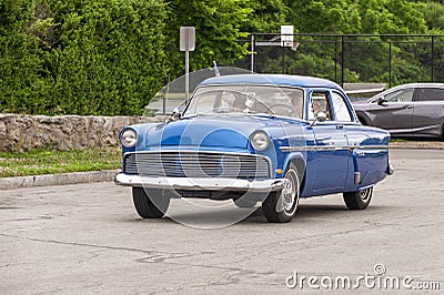 Classic sedan taking part in an Independence Day cruise Editorial Stock Photo