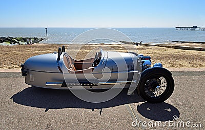 Classic Silver Morgan 3 wheeled Motor Car Parked on Seafront Promenade. Editorial Stock Photo