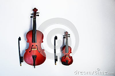 Classic stringed instruments cello and violin on white background Stock Photo