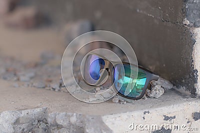 Classic Sunglasses model shoot in a urban place in a summer day. Selective focus Stock Photo