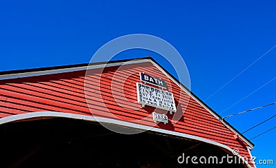 Classic timber built covered bridge seen in New England, USA. Editorial Stock Photo