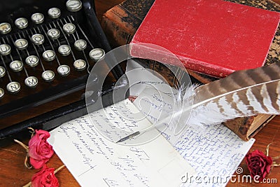 Classic type writer and antique books Stock Photo