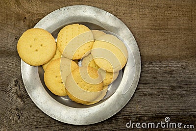Classic Vanilla Round Shortbread Cookies On Tin Plate Stock Photo