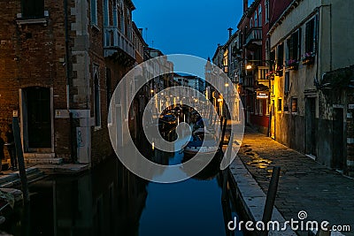 classic Venice scene with canals, boats and historic architecture Editorial Stock Photo