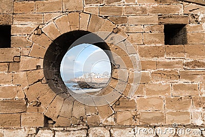 Classic view of medina Essaouira through a hole in the wall of t Stock Photo