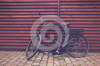 Classic Vintage Black Hipster Bicycle on the Street Stock Photo