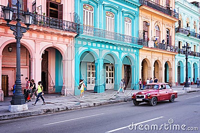 Classic vintage car and colorful colonial buildings in the main street of Old Havana Editorial Stock Photo