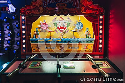 Classic vintage sideshow shooting gallery theme park arcade game carnival in casino game at the Hollywood Bowl Brighton Marina. Editorial Stock Photo