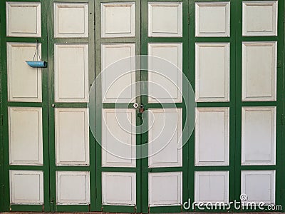 Classic vintage wood folding doors with light, home wall Stock Photo