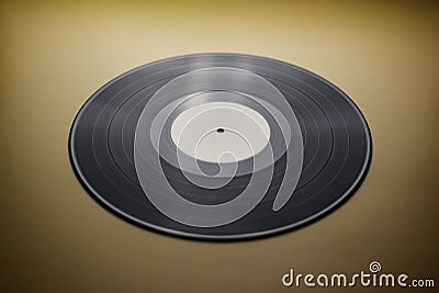 Classic vinyl record close-up on a yellow background, obsolete data storage, music Stock Photo