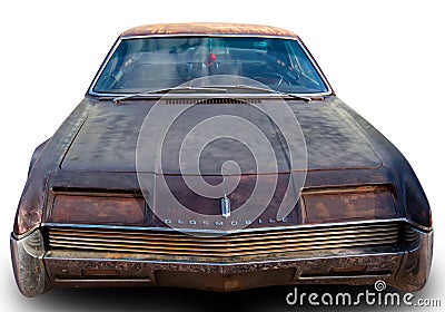 Classical American vintage muscle car 1966 Oldsmobile Toronado Deluxe Coupe in rat style. White background. Front view Editorial Stock Photo