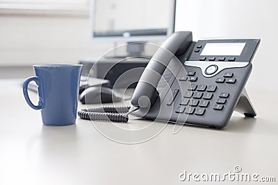 Classical black telephone in the office, customer support and telesale Stock Photo