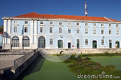 Classical buildings and remains of the docks in Sao Nicolau waterfront section, Lisbon, Portugal Stock Photo