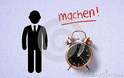 Classical copper colored alarm clock and a drawn person in a Wake Up concept with the message DO!!! Stock Photo