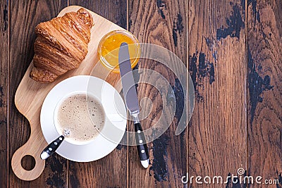 Classical french breakfast croissant and orange jam Stock Photo