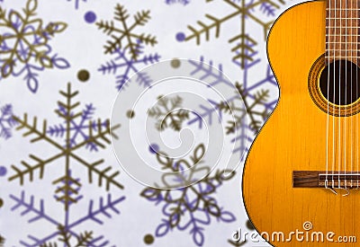 Classical guitar on the background of snowflakes Stock Photo