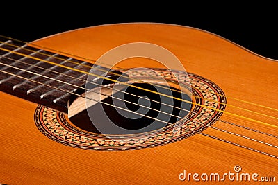 Classical guitar close up on dark Stock Photo