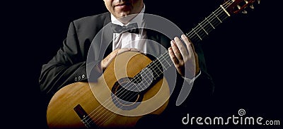 Classical Guitarist with Smoking Jacket Stock Photo