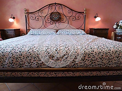 Double bed. Classical Italian bedroom. Stock Photo