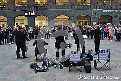 Classical music band playing street Editorial Stock Photo