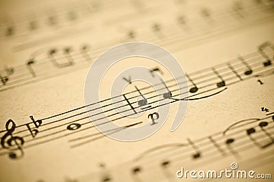 Classical music -notes on yellowed vintage paper Stock Photo