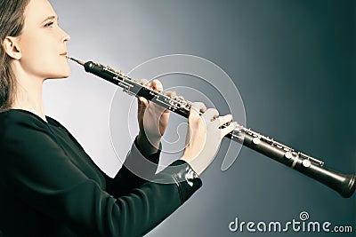 Classical musician oboe playing Stock Photo