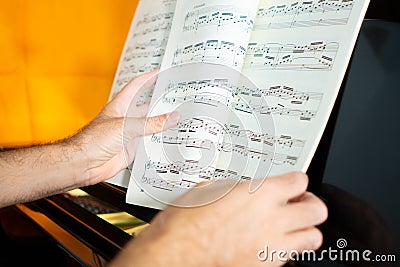 classical piece piano score, composed of ascending broken chords Stock Photo