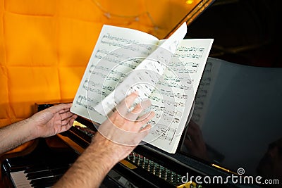 classical piece piano score, composed of ascending broken chords Stock Photo