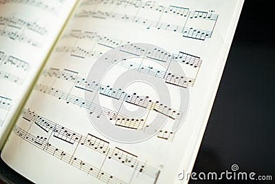 classical piece piano score, composed of ascending broken chords Stock Photo