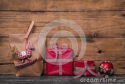 Classical red christmas gifts wrapped in paper with handmade sew Stock Photo