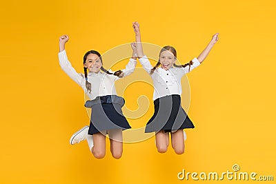 Classmates having fun at school Friends adorable pupils. Schoolgirls formal style perfect school uniform. Happy Stock Photo