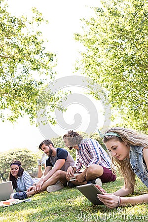 Classmates revising together on campus Stock Photo