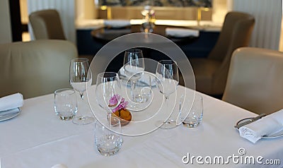 Classy elegant and modern restaurant at Amsterdam, The Netherlands in Europe. Seats, tables and lamps at luxury premium hotel. Stock Photo