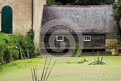 Claverton pumping station wooden building over pool Stock Photo