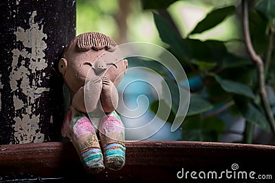 Clay children dolls on the clay basin. Stock Photo