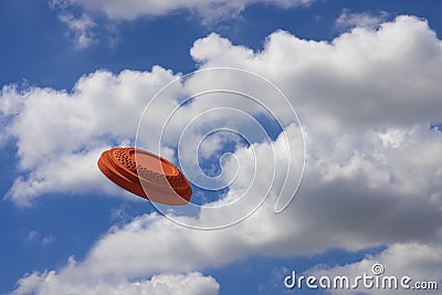 Clay disc target shooting flying on the blue sky , Clay pigeon targets game Stock Photo