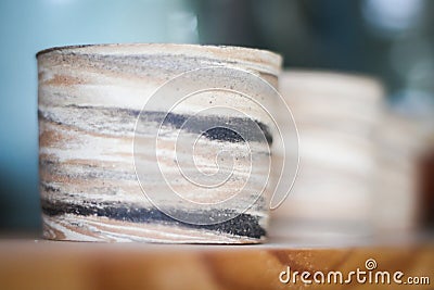 Clay drinking glasses in the works Stock Photo