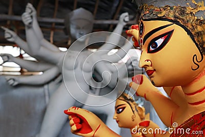 Clay idol of Hindu goddess Devi Durga. Idol of Hindu Goddess Durga during preparations in Kolkata. Editorial Stock Photo