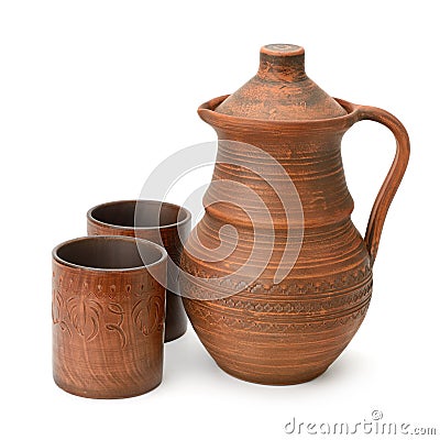 Clay jug and cup isolated on white Stock Photo