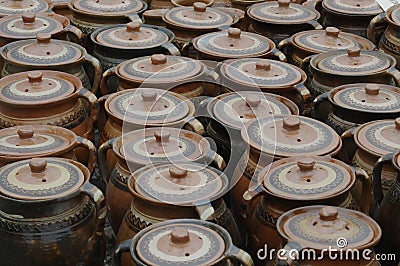 Clay pots with covers Stock Photo