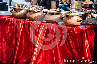 Clay pots with traditional Peruvian food Stock Photo