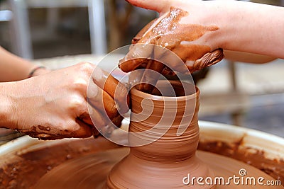 Clay potter hands wheel pottery teacher Stock Photo