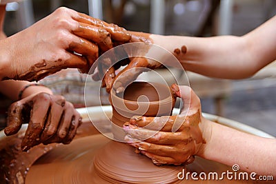 Clay potter hands wheel pottery work Stock Photo