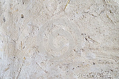 Clay stucco texture with straw. Adobe Stock Photo